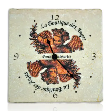 Horloge murale en marbre au logo de La Boutique des Anges, de face, angelots tête-bêche