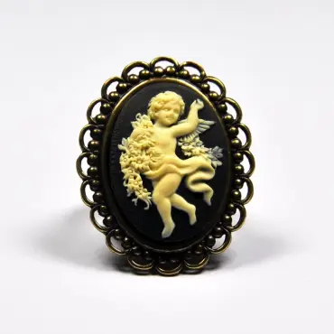 Camée noir de face : l'ange « La Danse » dans sa dentelle couleur bronze vieilli