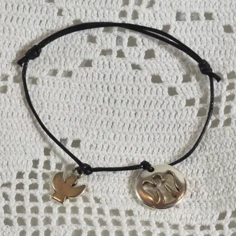 Bracelet ange argenté sur cordon noir : médaille ronde ajourée et petit ange plat en breloque