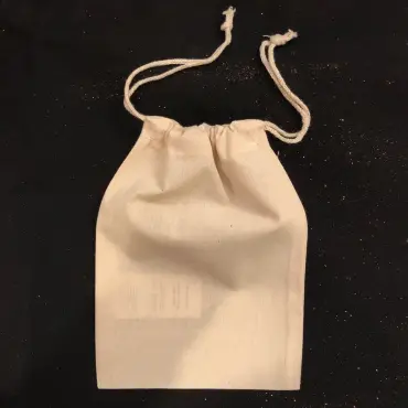 Sac « Le Sourire » moyen modèle fermé, cordon serré, vu du côté sans image