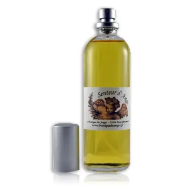 Flacon de parfum d'ambiance Senteur d'Ange de 100 ml, liquide jaune doré, capuchon argenté à côté